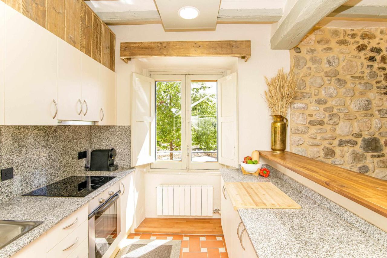 El Molino De Besalu Casa Con Jardin Villa Bagian luar foto